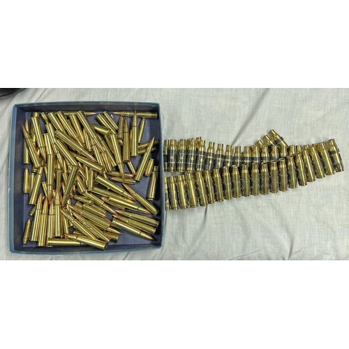 1042 - INERT AMMO TO INCLUDE A MACHINE GUN AMMO BELT WITH EMPTY BRASS CARTRIDGES, INERT 303 BULLETS, ETC