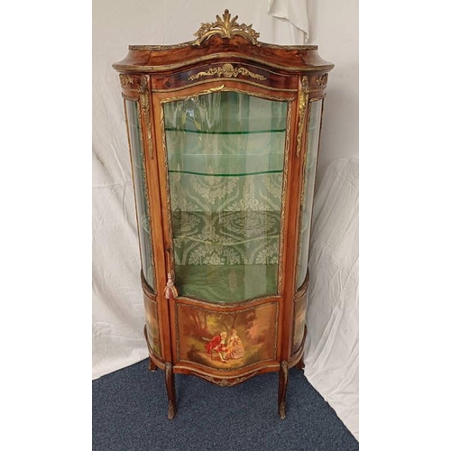 5000 - EARLY 20TH CENTURY WALNUT VITRINE WITH SHAPED FRONT & GLAZED PANEL DOOR WITH GILT ORMOLU MOUNTS, THE... 