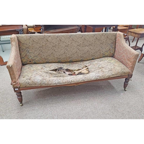 277 - 19TH CENTURY MAHOGANY FRAMED OVERSTUFFED 3 SEATER SETTEE WITH BRASS STUD WORK ON TURNED SUPPORTS