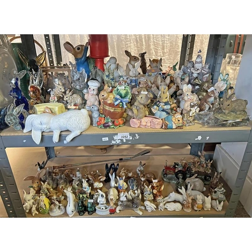 3252 - QUANTITY OF VARIOUS PORCELAIN & GLASS RABBITS OVER 2 SHELVES