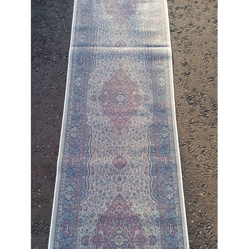 2063 - LARGE IVORY GROUND CASHMERE RUNNER WITH FULL PILE AND A TRADITIONAL MEDALLION DESIGN 502CM X 77CM