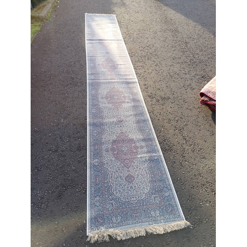 2063 - LARGE IVORY GROUND CASHMERE RUNNER WITH FULL PILE AND A TRADITIONAL MEDALLION DESIGN 502CM X 77CM