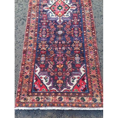 2100 - RICH BLUE GROUND FULL PILE PERSIAN SUK AND WOVEN RUNNER 300CM X 109CM