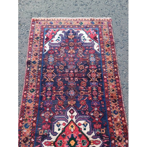 2100 - RICH BLUE GROUND FULL PILE PERSIAN SUK AND WOVEN RUNNER 300CM X 109CM