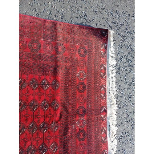 2118 - FINE HAND WOVEN RICH RED GROUND TURKMAN CARPET WITH ALL OVER BAKARA DESIGN 294CM X 191CM