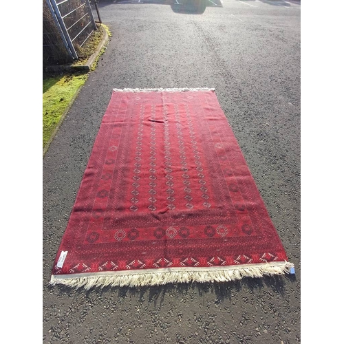 2118 - FINE HAND WOVEN RICH RED GROUND TURKMAN CARPET WITH ALL OVER BAKARA DESIGN 294CM X 191CM