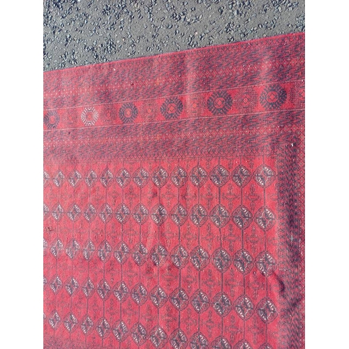 2118 - FINE HAND WOVEN RICH RED GROUND TURKMAN CARPET WITH ALL OVER BAKARA DESIGN 294CM X 191CM