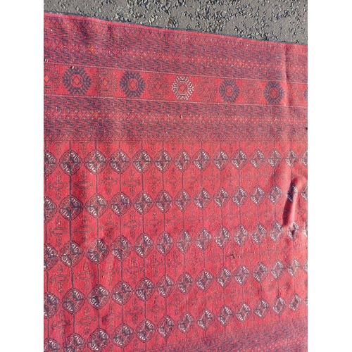 2118 - FINE HAND WOVEN RICH RED GROUND TURKMAN CARPET WITH ALL OVER BAKARA DESIGN 294CM X 191CM