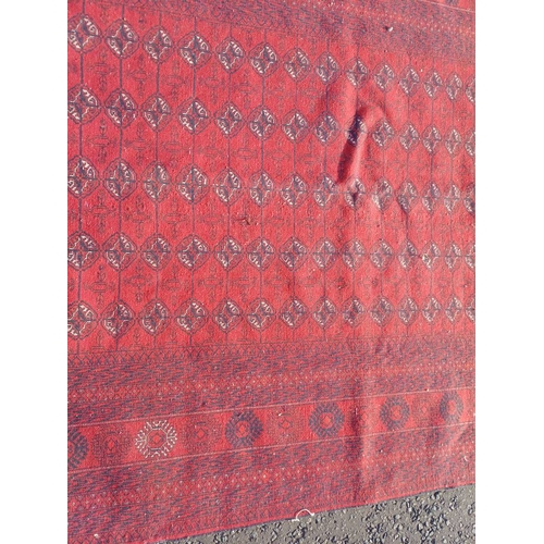 2118 - FINE HAND WOVEN RICH RED GROUND TURKMAN CARPET WITH ALL OVER BAKARA DESIGN 294CM X 191CM