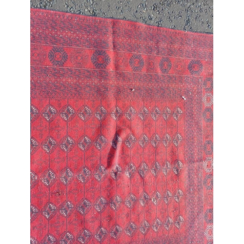 2118 - FINE HAND WOVEN RICH RED GROUND TURKMAN CARPET WITH ALL OVER BAKARA DESIGN 294CM X 191CM