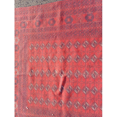 2118 - FINE HAND WOVEN RICH RED GROUND TURKMAN CARPET WITH ALL OVER BAKARA DESIGN 294CM X 191CM