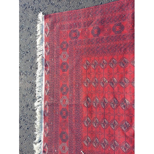 2118 - FINE HAND WOVEN RICH RED GROUND TURKMAN CARPET WITH ALL OVER BAKARA DESIGN 294CM X 191CM