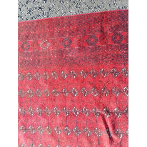 2118 - FINE HAND WOVEN RICH RED GROUND TURKMAN CARPET WITH ALL OVER BAKARA DESIGN 294CM X 191CM