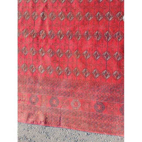 2118 - FINE HAND WOVEN RICH RED GROUND TURKMAN CARPET WITH ALL OVER BAKARA DESIGN 294CM X 191CM