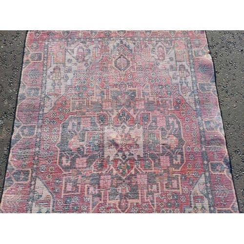 2130 - WASHED RED GROUND WOVEN PERSIAN HERIZ RUG WITH TRADITIONAL DESIGN  199CM X 159CM