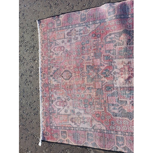 2130 - WASHED RED GROUND WOVEN PERSIAN HERIZ RUG WITH TRADITIONAL DESIGN  199CM X 159CM