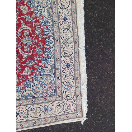 2133 - FINE HAND WOVEN PERSIAN NIAN CARPET WITH RED CENTRE WITH A IVORY SURROUND 289CM X 195CM