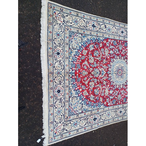 2133 - FINE HAND WOVEN PERSIAN NIAN CARPET WITH RED CENTRE WITH A IVORY SURROUND 289CM X 195CM