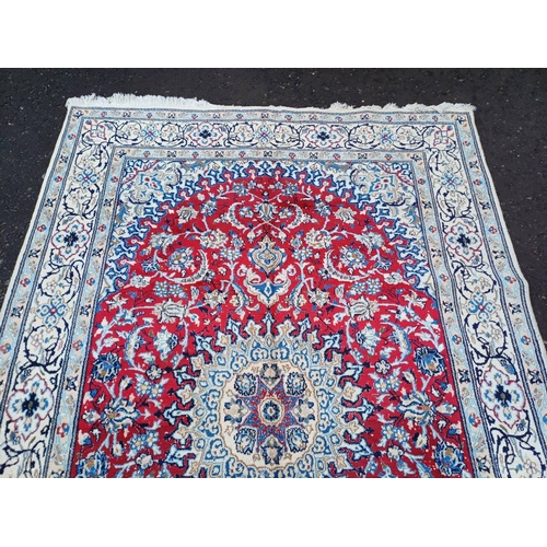 2133 - FINE HAND WOVEN PERSIAN NIAN CARPET WITH RED CENTRE WITH A IVORY SURROUND 289CM X 195CM