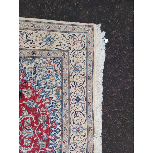 2133 - FINE HAND WOVEN PERSIAN NIAN CARPET WITH RED CENTRE WITH A IVORY SURROUND 289CM X 195CM