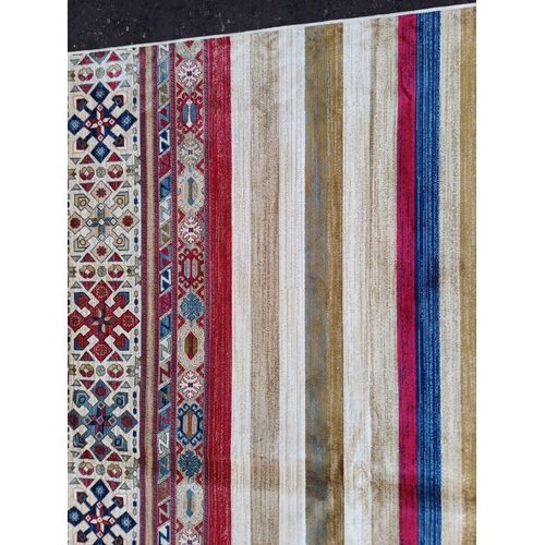 2139 - LARGE FULL PILE CASHMERE CARPET WITH MULTICOLOURED AZTEC DESIGN 383CM X 272CM