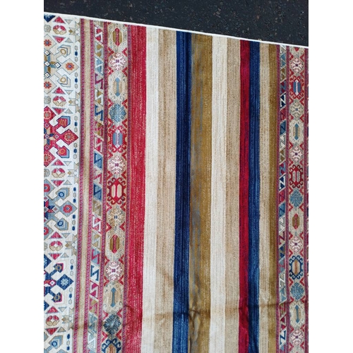 2139 - LARGE FULL PILE CASHMERE CARPET WITH MULTICOLOURED AZTEC DESIGN 383CM X 272CM