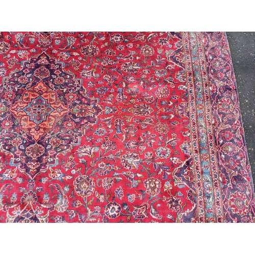 2145 - RED GROUND HAND WOVEN PERSIAN MASHED CARPET WITH FLORAL MEDALLION DESIGN 349CM X 262CM