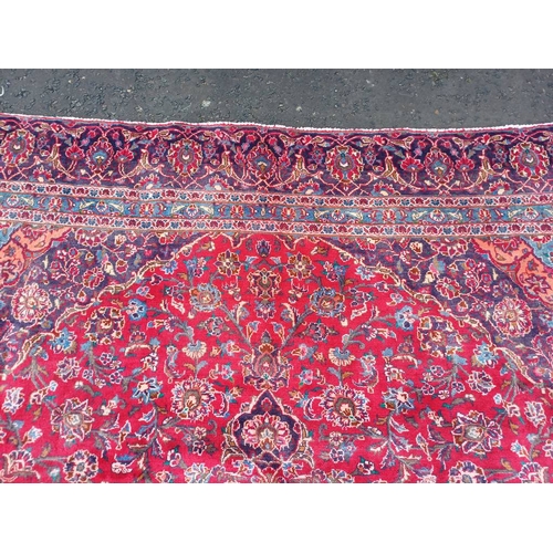 2145 - RED GROUND HAND WOVEN PERSIAN MASHED CARPET WITH FLORAL MEDALLION DESIGN 349CM X 262CM