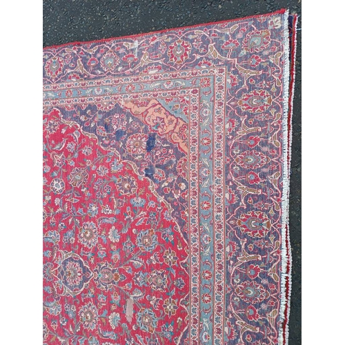 2145 - RED GROUND HAND WOVEN PERSIAN MASHED CARPET WITH FLORAL MEDALLION DESIGN 349CM X 262CM