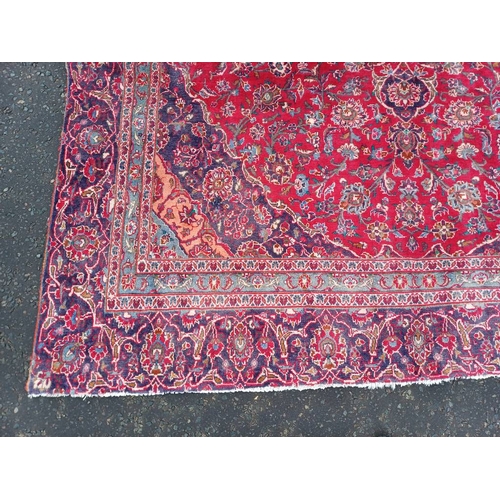 2145 - RED GROUND HAND WOVEN PERSIAN MASHED CARPET WITH FLORAL MEDALLION DESIGN 349CM X 262CM