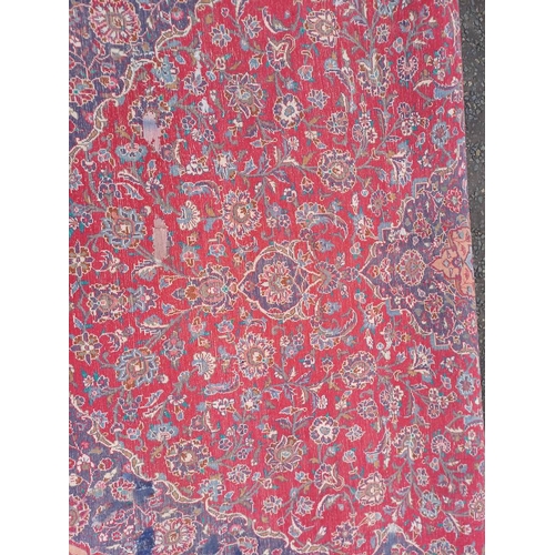 2145 - RED GROUND HAND WOVEN PERSIAN MASHED CARPET WITH FLORAL MEDALLION DESIGN 349CM X 262CM