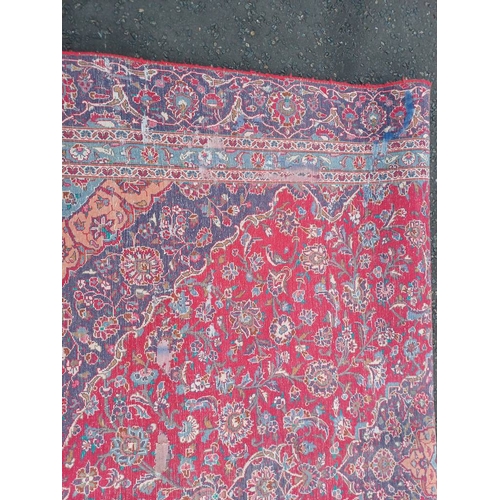 2145 - RED GROUND HAND WOVEN PERSIAN MASHED CARPET WITH FLORAL MEDALLION DESIGN 349CM X 262CM