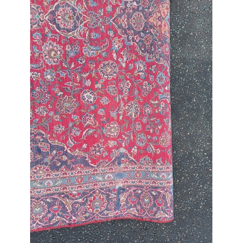 2145 - RED GROUND HAND WOVEN PERSIAN MASHED CARPET WITH FLORAL MEDALLION DESIGN 349CM X 262CM