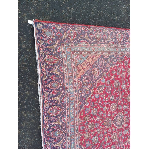 2145 - RED GROUND HAND WOVEN PERSIAN MASHED CARPET WITH FLORAL MEDALLION DESIGN 349CM X 262CM