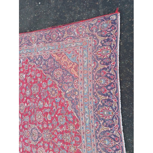 2145 - RED GROUND HAND WOVEN PERSIAN MASHED CARPET WITH FLORAL MEDALLION DESIGN 349CM X 262CM