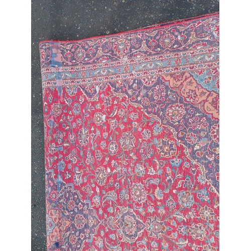 2145 - RED GROUND HAND WOVEN PERSIAN MASHED CARPET WITH FLORAL MEDALLION DESIGN 349CM X 262CM