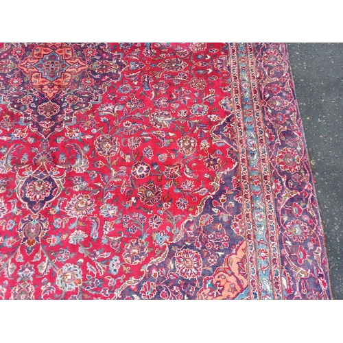 2145 - RED GROUND HAND WOVEN PERSIAN MASHED CARPET WITH FLORAL MEDALLION DESIGN 349CM X 262CM