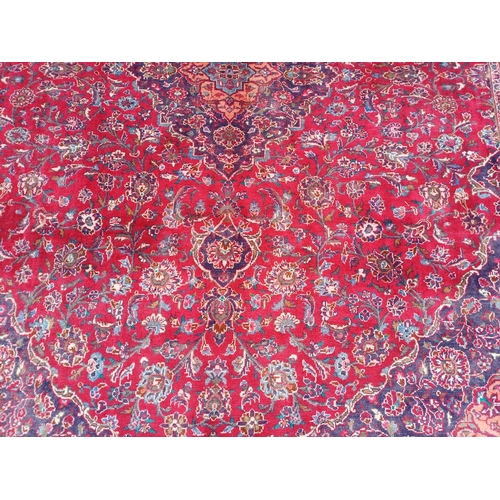 2145 - RED GROUND HAND WOVEN PERSIAN MASHED CARPET WITH FLORAL MEDALLION DESIGN 349CM X 262CM