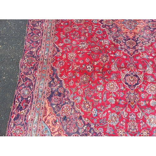 2145 - RED GROUND HAND WOVEN PERSIAN MASHED CARPET WITH FLORAL MEDALLION DESIGN 349CM X 262CM