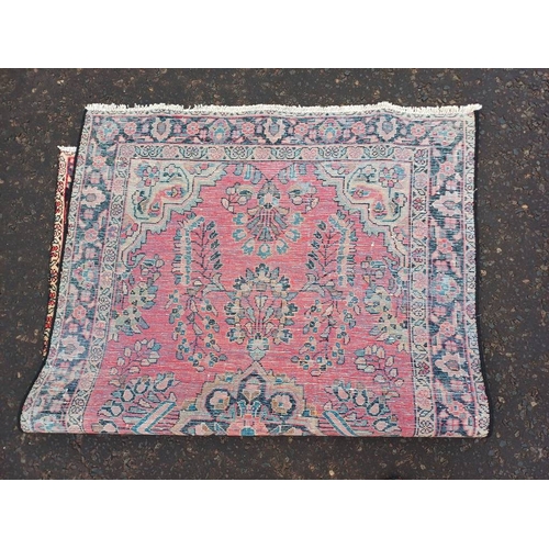 2178 - WASHED RED GROUND PERSIAN VILLAGE RUG WITH CENTRE MEDALLION DESIGN 189CM X 122CM