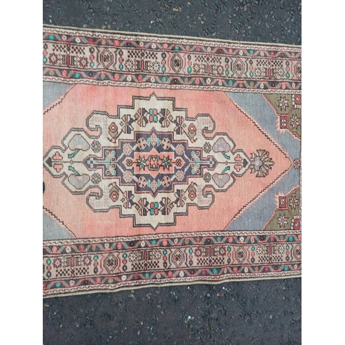 2184 - MULTICOLOURED GROUND HAND WOVEN CAUCASIAN RUG WITH UNIQUE MEDALLION DESIGN 186 X 104CM