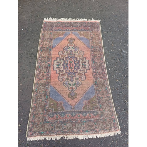 2184 - MULTICOLOURED GROUND HAND WOVEN CAUCASIAN RUG WITH UNIQUE MEDALLION DESIGN 186 X 104CM