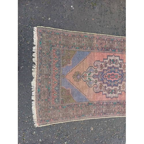 2184 - MULTICOLOURED GROUND HAND WOVEN CAUCASIAN RUG WITH UNIQUE MEDALLION DESIGN 186 X 104CM