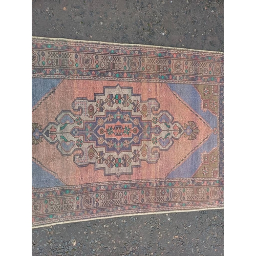 2184 - MULTICOLOURED GROUND HAND WOVEN CAUCASIAN RUG WITH UNIQUE MEDALLION DESIGN 186 X 104CM