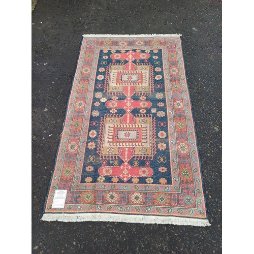 2190 - HAND WOVEN FULL PILE CAUCASIAN RUG, BLUE GROUND WITH A GEOMETRICAL MEDALLION DESIGN 201 X 120CM