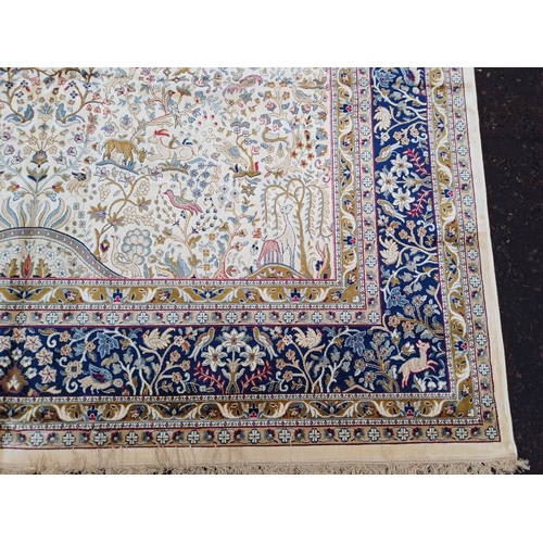 2196 - LARGE FULL PILE IVORY GROUND CASHMERE CARPET WITH ALL OVER TREE OF LIFE DESIGN WITH SURROUNDING BLUE... 