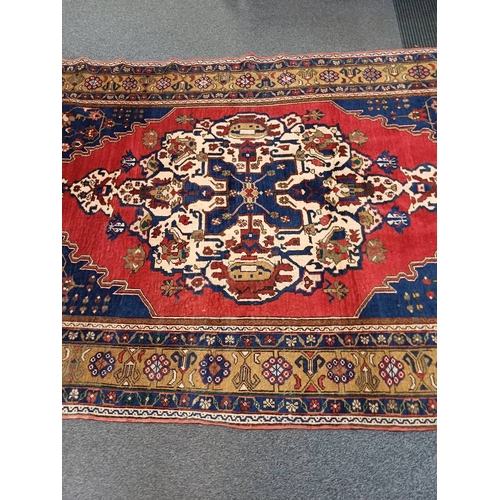 2231 - RED & BLUE GROUND TURKISH CARPET WITH ALL OVER DESIGN