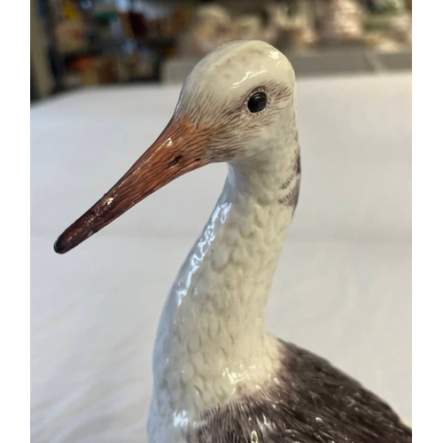 3058C - MEISSEN STYLE PORCELAIN FIGURE OF A BIRD WITH CROSSED SWORD MARK & 2083 TO BASE - 26 CM TALL