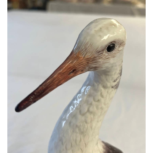 3058C - MEISSEN STYLE PORCELAIN FIGURE OF A BIRD WITH CROSSED SWORD MARK & 2083 TO BASE - 26 CM TALL