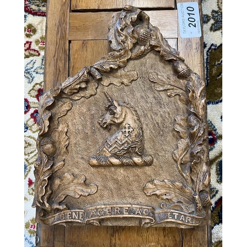 2010 - LATE 19TH OR EARLY 20TH CENTURY WALNUT BOOK SLIDE WITH CARVED ENDS, ENDS CARVED WITH FOLIAGE & CROSS... 